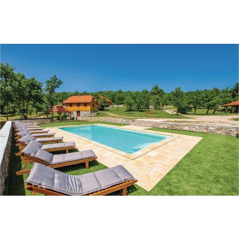 Amazing home in Perusic with 2 Bedrooms, WiFi and Outdoor swimming pool